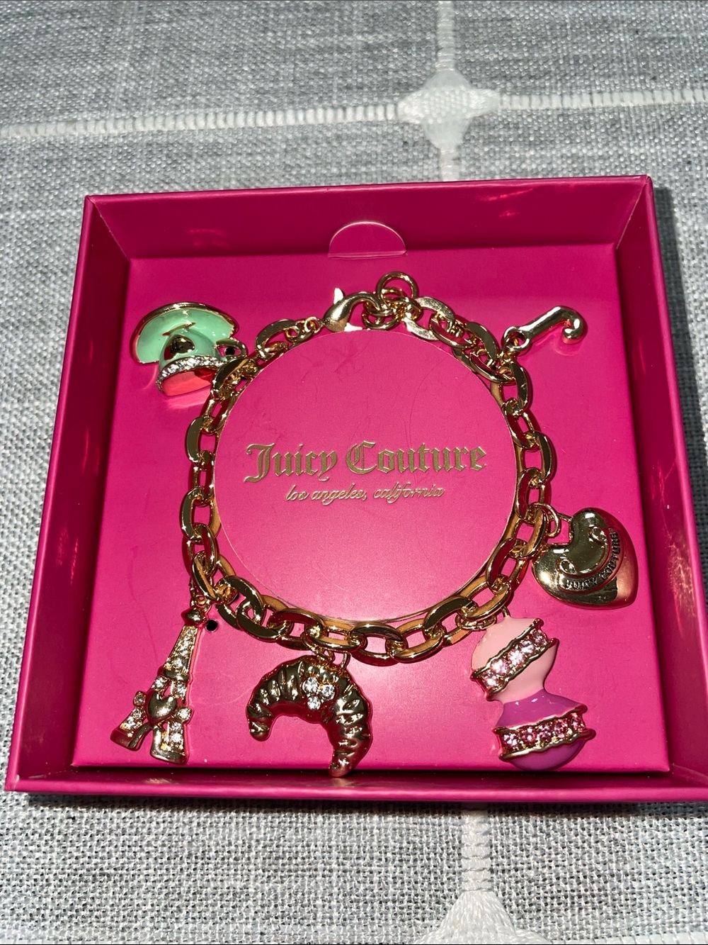 Juicy Couture Gold Charm Bracelet with Pink macaron, Green cappuccino charms